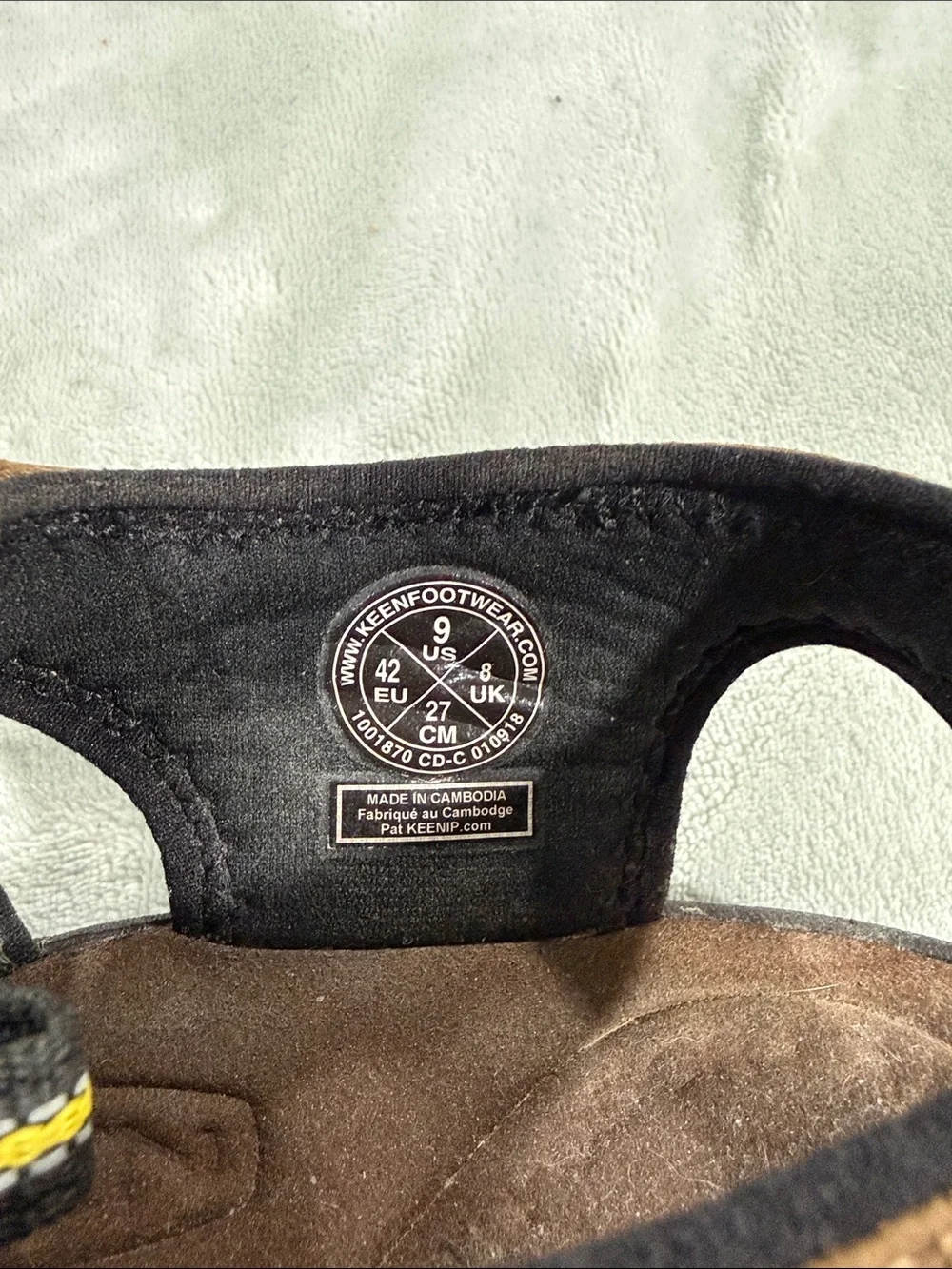 KEEN Brown and Black Men’s Closed-Toe Sandals with Yellow Accents. Never worn.